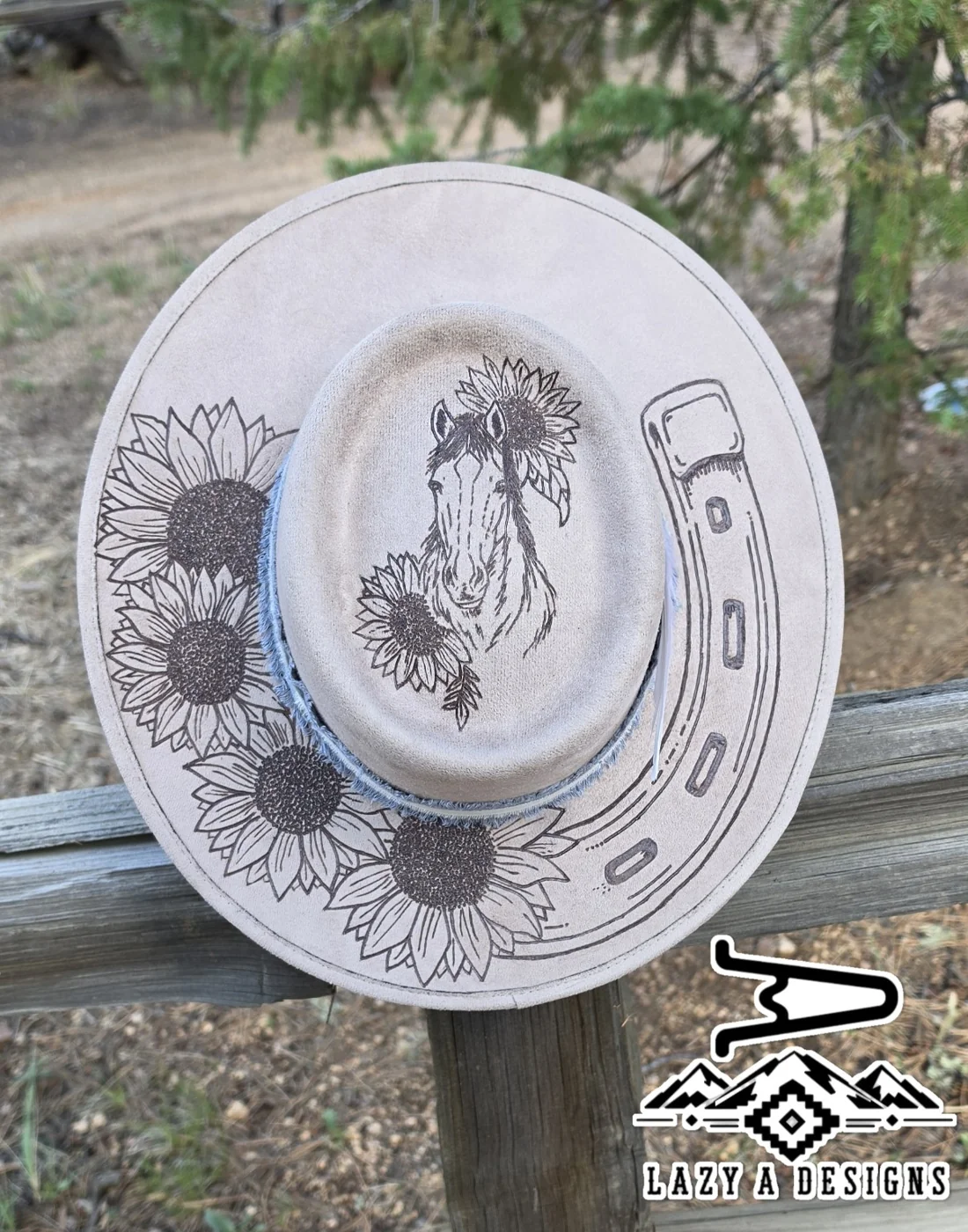 An example of Lazy A Designs engraved hat artwork
